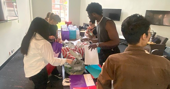 MCHSO students packing gift bags for mothers